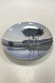 Bing and 
Grondahl Art 
Nouveau Plate 
with motif of 
lake and forest 
No 8179 / 357 . 
25
Measures ...