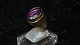Elegant ladies 
ring with 
Armetyst in 14 
carat gold
Stamped 585 
GIFA
Str 63
Nice and well 
...