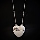 Georg Jensen, 
Astrid Fog; A 
heart shaped 
necklace of 
sterling silver 
#126. Pendant 
6,5 x 6,5 cm. 
...