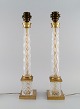A pair of tall 
and sleek table 
lamps in clear 
crystal glass 
and brass. 
France, 1960s / 
...