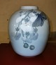 Porcelain vase 
with decoration 
of branch with 
flowers and 
butterfly. 
Appears in good 
condition ...