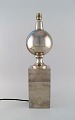 Philippe 
Barbier, Paris. 
French designer 
table lamp in 
satin chromed 
metal. 1970s.
Measures: 45 
...