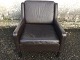 Armchair in 
brown leather 
with dark 
stained legs. 
Danish modern. 
Nice - slightly 
patinated ...