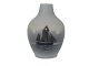 Royal 
Copenhagen 
small vase with 
ship.
The factory 
mark tells, 
that this was 
produced in ...