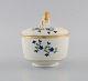 Antique German 
sugar bowl in 
hand-painted 
porcelain with 
flowers and 
gold edges. Lid 
knob ...