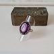 Antique 14 kt 
gold ring - 
large beautiful 
amethyst 
surrounded by 
numerous 
diamonds 
Appears ...
