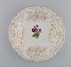 Antique Meissen 
porcelain bowl 
with 
hand-painted 
flowers and 
gold 
decoration. 
Early 20th ...