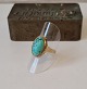 Vintage ring in 
14 kt gold with 
large turquoise
Stamped 585
Measure on the 
stone 13 x 20 
...