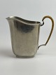 Just Andersen 
jug of pewter 
with handle 
with wicker. 
Height: 12.80 
centimeters. 
Width: ...