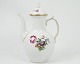 Royal 
Copenhagen 
coffee pot in 
the pattern 
Saxon flower 
no. 9223. 
Stands whole 
and without ...
