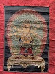 Asian Buddhist 
Thangka 
painting, 
hand-painted on 
canvas, mounted 
in hand-sewn 
cloth of cotton 
...