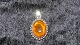 Elegant Pendant 
With Amber and 
Silver
Stamped 925 CL
Length 3.5 cm
Nice and well 
maintained ...