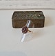 Vintage rosette 
ring in 14 kt 
gold with 
numerous 
garnets 
Stamped: 
V.Lind - 585
Ring size 53 - 
...