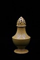 Old salt 
sprinkle in 
ocher colored 
faience with 
fine patina.
Height: 11cm.