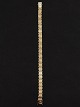 14 carat gold 
brick bracelet 
19.5 cm. B. 0.7 
cm. 16.7 gr. 
Item no. 491097 

Stock: 1