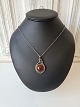 Hermann 
Siersbøl 
vintage 
necklace in 
silver with 
large pendant 
with amber. The 
amber bead is 
...