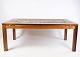 The coffee 
table adorned 
with tiles in 
rosewood Danish 
design from the 
1960s is a 
stunning ...