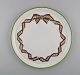 Limoges, 
France. Rare 
Christian Dior 
"Spring" tray / 
dish in 
porcelain 
decorated with 
ribbon and ...
