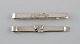 Two tie pins in 
silver (830) 
with flowers 
and foliage. 
Denmark, 1940s.
Largest 
measures: 7 x 1 
...