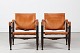 Aage Bruun & 
Son
Pair of safari 
chairs with 
frame of dark 
oak
and genuine 
cognac-coloured 
...
