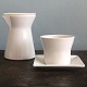 Water carafe 
and porcelain 
cup. 
Hour-shaped 
water carafe 
with onion H. 
15 cm. Top 12 
cm, bottom ...