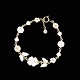 Bernhard Hertz 
/ Lund CPH. 
Gilded Sterling 
Silver Daisy 
Bracelet with 
White Enamel.
Crafted by ...