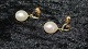 Elegant 
Earrings with 
Pearl 14 carat 
gold
Stamped 585
Height 19.09 
mm approx
Nice and well 
...