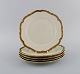 KPM, Berlin. 
Five Royal 
Ivory lunch 
plates in 
cream-colored 
porcelain with 
gold 
decoration. ...