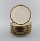 KPM, Berlin. 
Twelve Royal 
Ivory lunch 
plates in 
cream-colored 
porcelain with 
gold 
decoration. ...