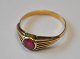 14 carat gold 
ring with ruby, 
20th century 
Denmark. 
Stamped. Size: 
52. Weight: 1.7 
grams.