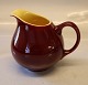 Creamer 9.5 cm 
yellow and 
bordaux Kongo 
Retro from 
Kronjyden 
Randers Yellow 
and red.  In 
mint ...