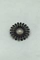 Georg Jensen 
Sterling Silver 
Marguerit 
(Daisy) Brooch, 
Black Measures 
Diam 4.2 cm 
(1.65 inch) ...