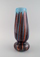 Large Murano 
vase in mouth 
blown art 
glass. Italian 
design, 1960s / 
70s.
Measures: 35.5 
x 14.5 ...