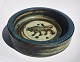 Dish in 
stoneware from 
Royal 
Copenhagen. At 
the bottom with 
decoration of 
standing bull. 
Appears ...