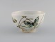 Nils Thorsson 
for Royal 
Copenhagen. 
Rare bowl in 
glazed faience 
decorated with 
butterflies. 
...