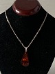 Necklace in 
Silver with 
Amber pendant
Length 62 cm
Stamped 925 p
Nice and well 
maintained ...