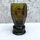 Richly 
decorated green 
lodge glass 
engraved with 
masonic symbols 
and signs. 14 
cm high, 7 cm 
in ...