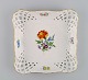 Square Meissen 
dish / bowl in 
openwork 
porcelain with 
hand-painted 
flowers and 
gold edge. 
Early ...
