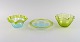 Scandinavian 
glass artist. 
Plate and two 
bowls in 
mouth-blown art 
glass with wavy 
edges. The ...