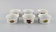 Royal 
Worcester, 
England. Six 
small Evesham 
porcelain bowls 
decorated with 
fruits and gold 
rim. ...