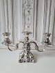 Three-armed 
silver 
candlestick in 
rococo-inspired 
design 
Stamped: H.J - 
830 
Height 19 cm. 
...