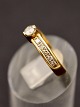 14 carat gold 
ring size 50 
with diamond 
approx. 0.20 
carat and 
several small 
diamonds item 
no. ...