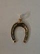 Horse shoe in 
14 karat gold
Stamped 585
Height 26.03 
mm approx
Thickness 1.69 
mm approx
Nice ...