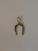 Horse shoe in 
14 karat gold
Stamped 585
Height 16.91 
mm approx
Thickness 0.70 
mm approx
Nice ...