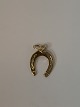 Horse shoe in 
14 karat gold
Stamped 585
Height 19.12 
mm approx
Thickness 0.80 
mm approx
Nice ...