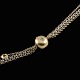 Ole Lynggaard. 
Three-strand 
14k White & 
Yellow Gold 
Necklace with 
Diamond Clasp.
Double-sided 
...