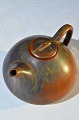 Saxbo ceramics, 
Eva 
Stæhr-Nielsen 
teapot with 
glaze in 
reddish brown 
and greenish 
shades, height 
...