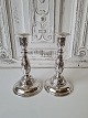 Pair of 
beautiful 
silver 
candlesticks 
with Rococo 
decoration 
Stamped the 
three towers 
Height ...