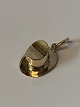 Hat in 14 carat 
gold
Stamped 585
Measures 16.25 
mm approx
Width 10.60 mm
The item has 
been ...