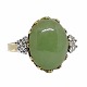 Hugo Grün; A 
14k gold and 
white gold ring 
set with jade 
and diamonds. 
Weighing app. 
0,30 ct. ...